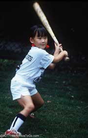 Girl playing baseball; Actual size=180 pixels wide